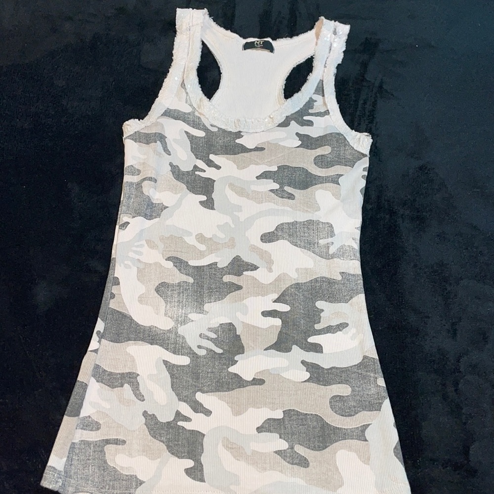 Light pink razorback tank top with sequence accents around the top front/back
